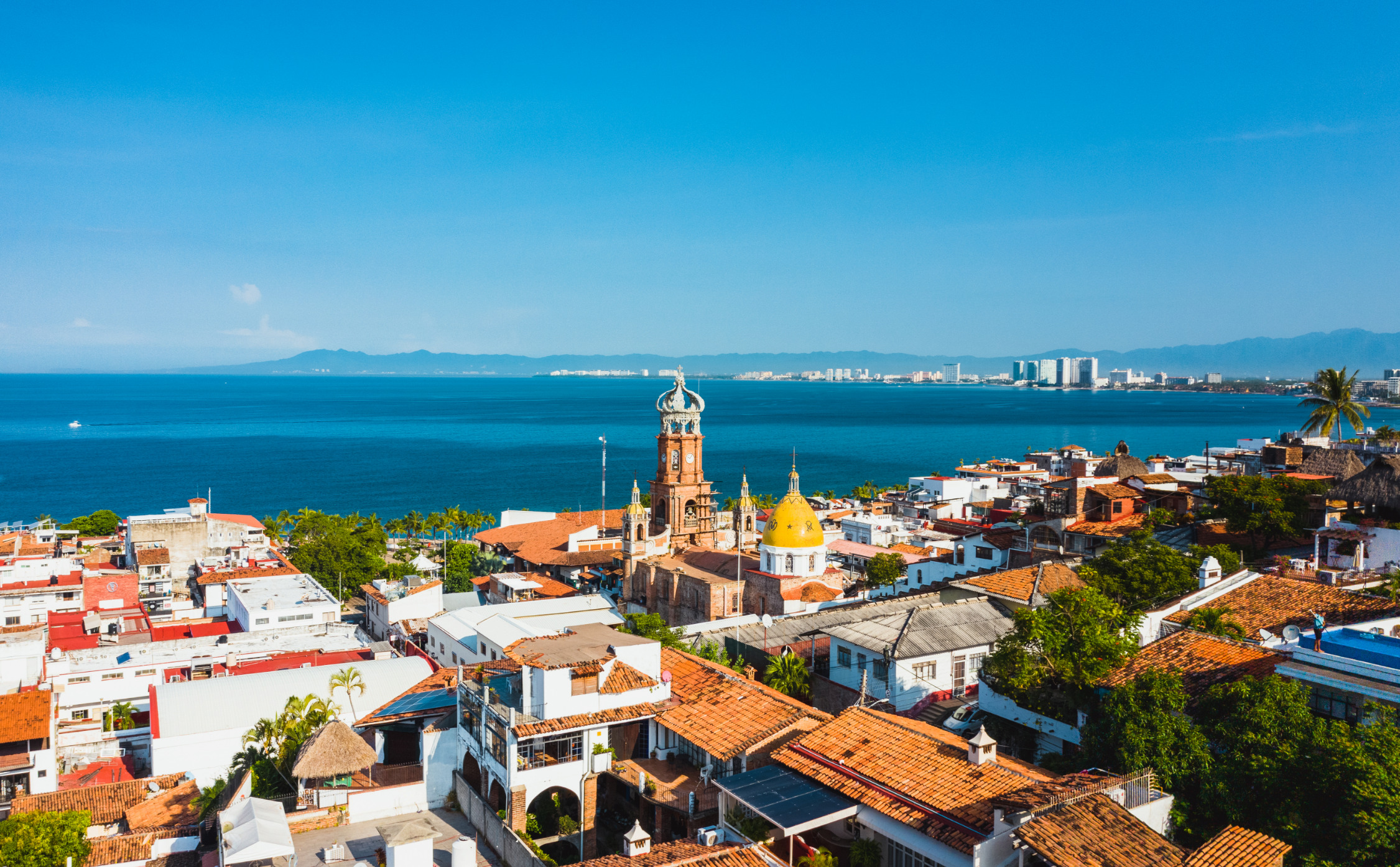aerial shot of town by the ocean in Puerto Vallarta, Mexico